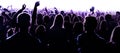 Night club silhouette crowd hands up at confetti steam stage Royalty Free Stock Photo