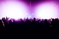 Night club silhouette crowd hands up at confetti steam stage