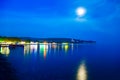 Night coast. Boat. Moon. Sea. Royalty Free Stock Photo