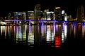 Night colorful Miami, Florida beautiful skyline cityscape view bright lights water ocean reflection Royalty Free Stock Photo