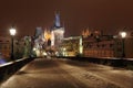 Night colorful snowy Prague gothic Castle from Charles Bridge Royalty Free Stock Photo