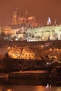 Night colorful snowy Prague gothic Castle, Czech Republic Royalty Free Stock Photo