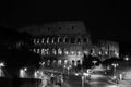 Night Colosseum with illumination. Black and white photo