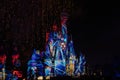 Night colour projections on Cinderella Castle from Halloween party