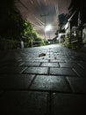 Night come over after rain make a wet street Royalty Free Stock Photo