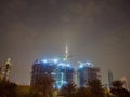 Night construction of high-rise buildings in Dubai. Royalty Free Stock Photo