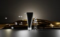 Night cosmetics bottles with golden silk fabric and silver pearls on background. Cosmetic beauty product, black tube