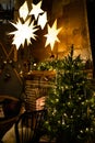 night.country house with fireplace and Christmas tree decorated for the holidays Royalty Free Stock Photo