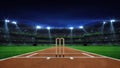 Night cricket pitch scene with spotlight shine and wooden wicket front Royalty Free Stock Photo