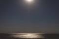 Night dark sky with moon light over the sea. Long exposure of the starry sky. Romantic  background with copy space Royalty Free Stock Photo