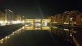 A night and day view of famous ponte vecchio bridge on the arno river florence Royalty Free Stock Photo