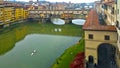 A night and day view of famous ponte vecchio bridge on the arno river florence Royalty Free Stock Photo