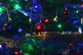 Night detail of christmas tree with baubles decoration