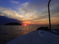 Getting ready for an adventure of night dive with beautiful sunset view on surface. Royalty Free Stock Photo