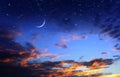 Night  dramatic sunset and  moon on  starry sky star  fall wind on blue lilac nebula  with planet flares universe weather forecast Royalty Free Stock Photo