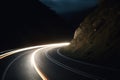 Night Drive on a Curvy Mountain Road with Long Exposure Light Trails Royalty Free Stock Photo