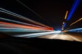 Night driving.Long exposure photo.City colorful night lights perspective blurred by high speed of the car.