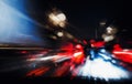 Night driving.Long exposure photo.City colorful night lights perspective blurred by high speed of the car.