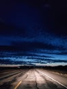 Night driving on a two lane rural road Royalty Free Stock Photo