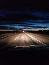 Night driving on a two lane rural road Royalty Free Stock Photo