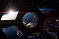 The night Earth from porthole on space station Royalty Free Stock Photo