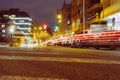 night European city, lights from passing cars on the road. Landscape of a night city, there is a place for an Royalty Free Stock Photo
