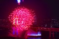 A night fireworks near Rainbow bridge at the urban city in Tokyo long shot Royalty Free Stock Photo