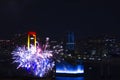 A night fireworks near Rainbow bridge at the urban city in Tokyo long shot Royalty Free Stock Photo