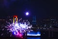 A night fireworks near Rainbow bridge at the urban city in Tokyo long shot Royalty Free Stock Photo