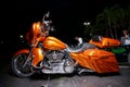 Night flash photo of a custom painted Harley Davidson motorcycle