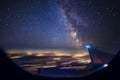 Night flight over cities. View from air plane at night