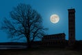 The Heilandskirche south of Berlin in winter with a full moon.