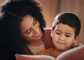 Night, happy and mother with child and book for bedtime storytelling, fairytale and education. Relax, reading and smile Royalty Free Stock Photo