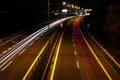 Night highway with car lines in both directions of road traffic Royalty Free Stock Photo