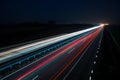 Night highway with car traffic and blurry lights Royalty Free Stock Photo