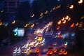 Night highway with cars in city. Traffic Blurred focus. In move Royalty Free Stock Photo