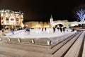 Night ice skating scene from Place d`Youville quebec