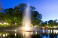 Night illuminated fountain at city canal in Riga, Latvia Royalty Free Stock Photo