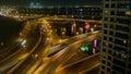 Night illumination dubai traffic downtown roof top panorama timelapse. Night light dubai traffic road timelapse