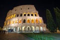 A night image of the Colosseum with stars above. A police van si Royalty Free Stock Photo