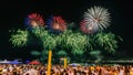 Night image with New Year`s Eve RÃÂ©veillon fireworks exploding in the sky. Royalty Free Stock Photo