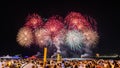 Night image with New Year`s Eve RÃÂ©veillon fireworks exploding in the sky. Royalty Free Stock Photo