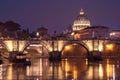 Night image of St. Peter`s Basilica, Ponte Sant Angelo and Tiber River in Rome