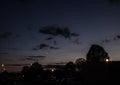 Night landscape, against the background of the city and trees at sunset. Nature. Royalty Free Stock Photo