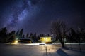 Night landscape with colorful Milky Way above the lonely house in dark forest in Russia. Royalty Free Stock Photo