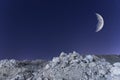 Night landscape with the growing moon in the night sky over the stone desert in Sinai, Egypt Royalty Free Stock Photo