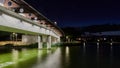 Night landscape of an illuminated bridge over a river Royalty Free Stock Photo