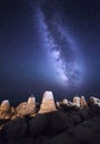 Night landscape with milky way at the sea with breakwaters Royalty Free Stock Photo