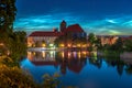 Night landscape noctilucent clouds NLC in the upper atmosphere of Earth above Wroclaw. Beautiful night shining clouds and stars