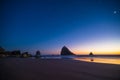 Night landscape of pacific ocean beach in USA, cliffs, and night stars. Beautiful sunset Royalty Free Stock Photo
